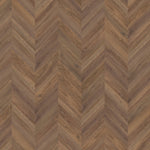 mFLOR Parva Oak Chevron 42216 Liguria PVC vloer biedt een elegante Hongaarse punt patroon, perfect voor zowel moderne als klassieke interieurs