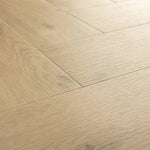 Quick Step Pristine SGHBC20326 Ocean Bliss Naturel pvc vloer, visgraatpatroon in lichte natureltinten voor een serene uitstraling