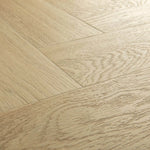 Quick Step Pristine SGHBC20331 Serene Eik Licht Naturel pvc vloer, visgraatpatroon in lichte eik, perfect voor een stijlvolle en tijdloze uitstraling