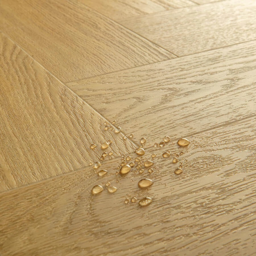 Quick Step Pristine SGHBC20332 Serene Eik Medium Naturel pvc vloer, visgraatpatroon in warme eikentint voor een elegante uitstraling