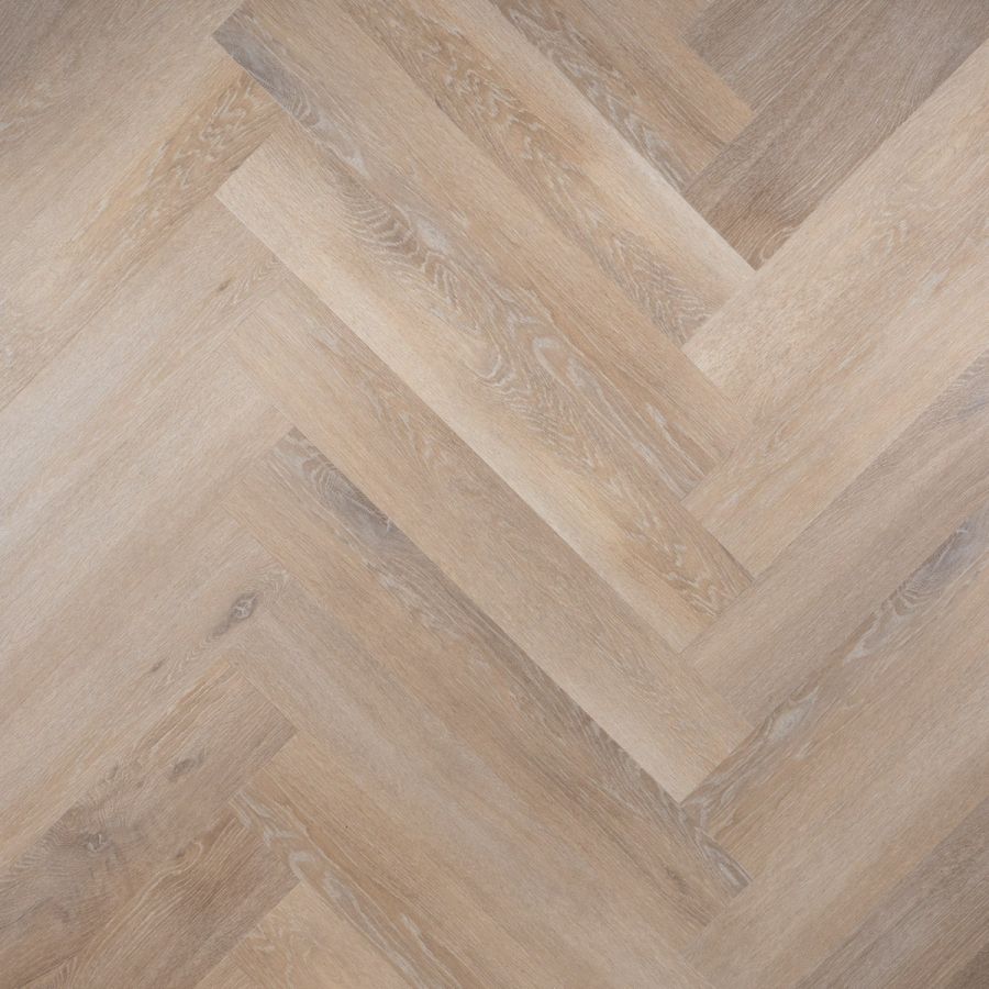 Moderne Otium Herringbone Ava 94605 PVC vloer in een eigentijdse ruimte, met een subtiel visgraatpatroon en een luxe, natuurlijke uitstraling