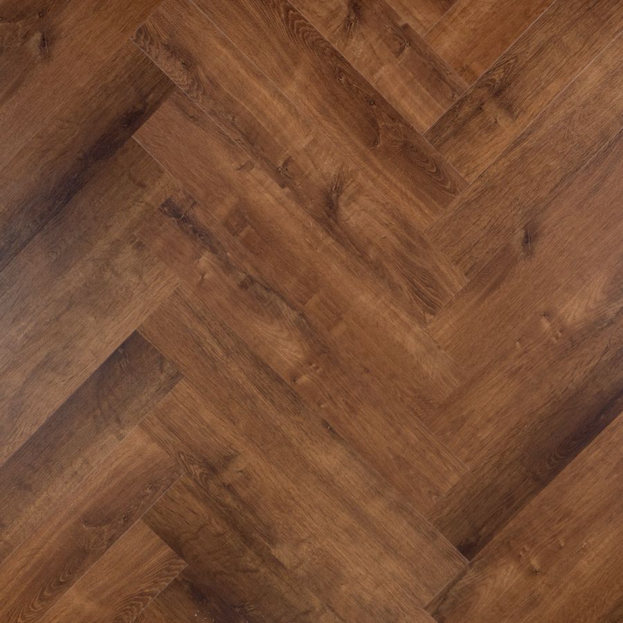Stijlvolle Otium Herringbone Dawn 94625 PVC vloer in een eigentijdse ruimte, met visgraatpatroon en een warme, uitnodigende uitstraling