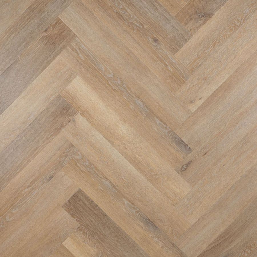 Stijlvolle Otium Herringbone Lily 94609 PVC vloer in een eigentijdse ruimte, met een verfijnd visgraatpatroon en een warme, elegante uitstraling