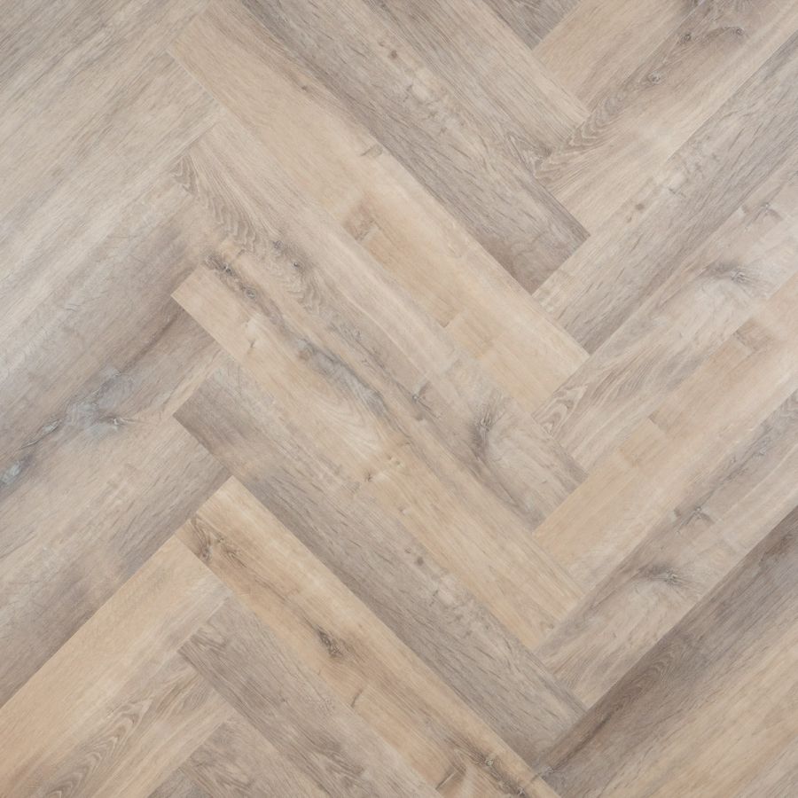 Elegante Otium Herringbone Mist 94621 PVC vloer in een moderne ruimte, met een subtiel visgraatpatroon en een koele, verfijnde uitstraling