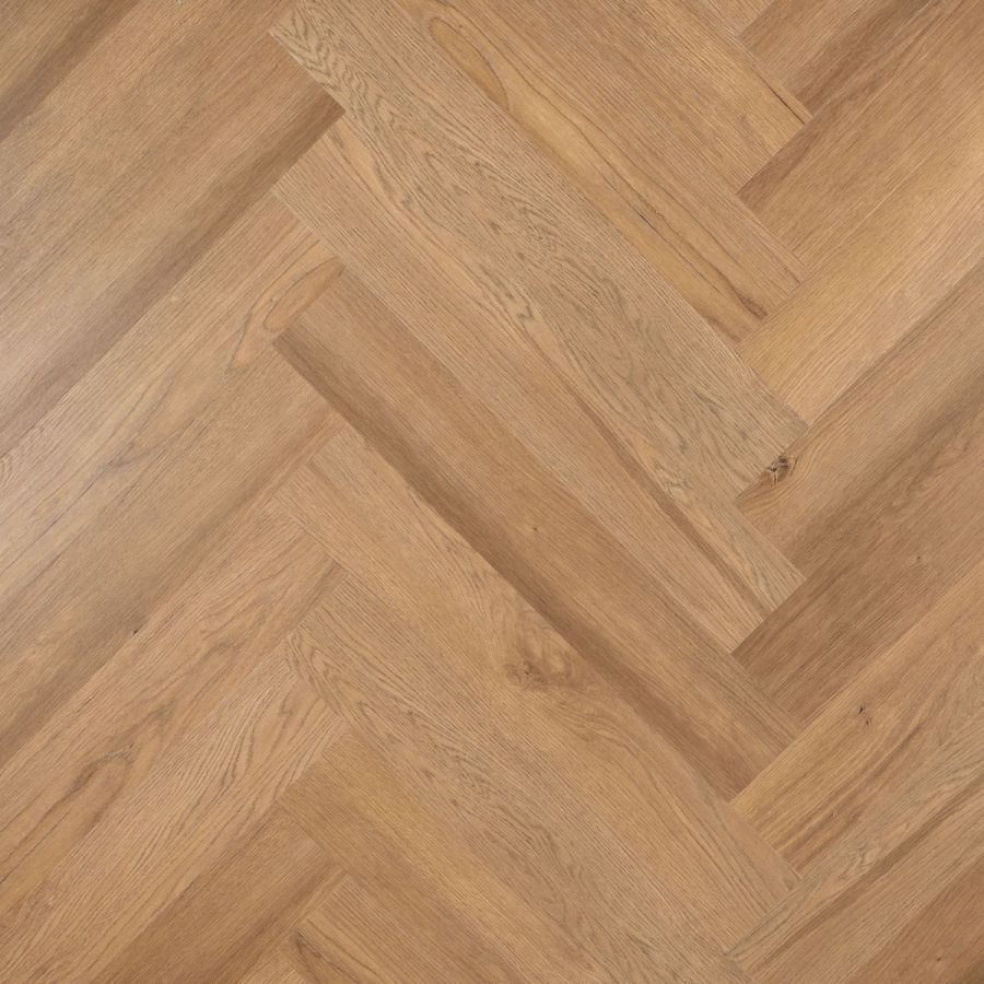 Stijlvolle Otium Herringbone Onyx 94641 PVC vloer in een eigentijdse ruimte, met een verfijnd visgraatpatroon en een rijke, donkere uitstraling
