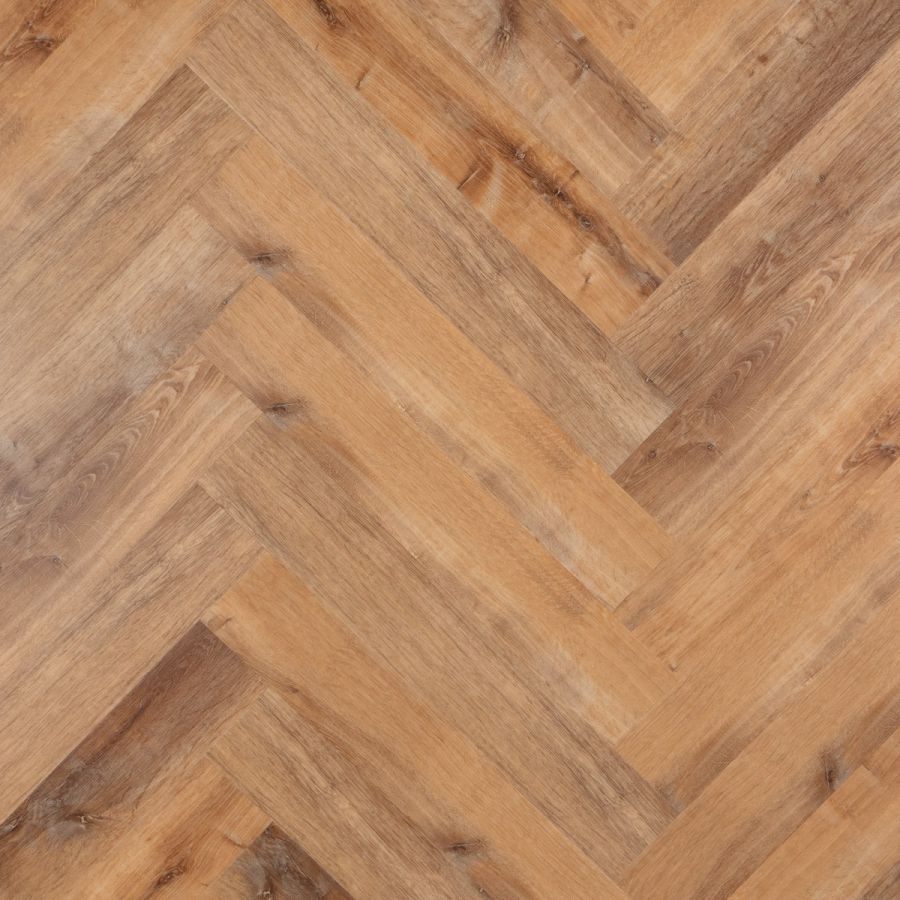 Stijlvolle Otium Herringbone Oase 94617 PVC vloer in een eigentijdse ruimte, met een verfijnd visgraatpatroon en een 
natuurlijke uitstraling