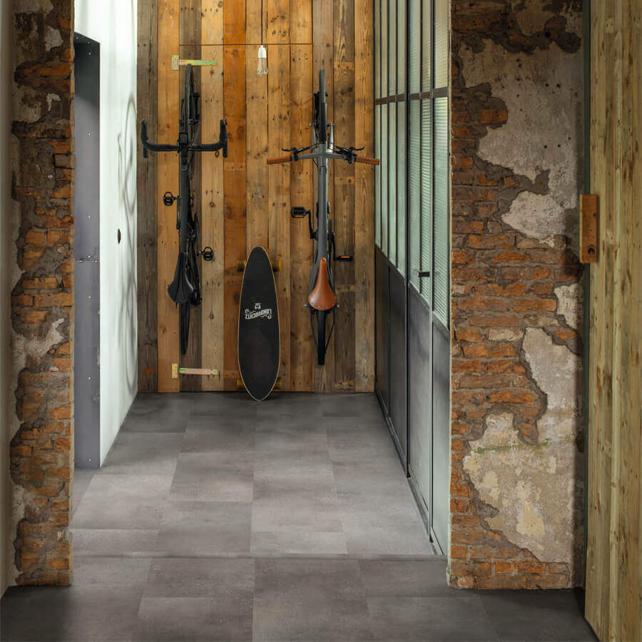 Quick Step Oro AVSTU40234 Betonrots pvc vloer, duurzame click-vloer in betonrots design, perfect voor een eigentijds en stijlvol interieur