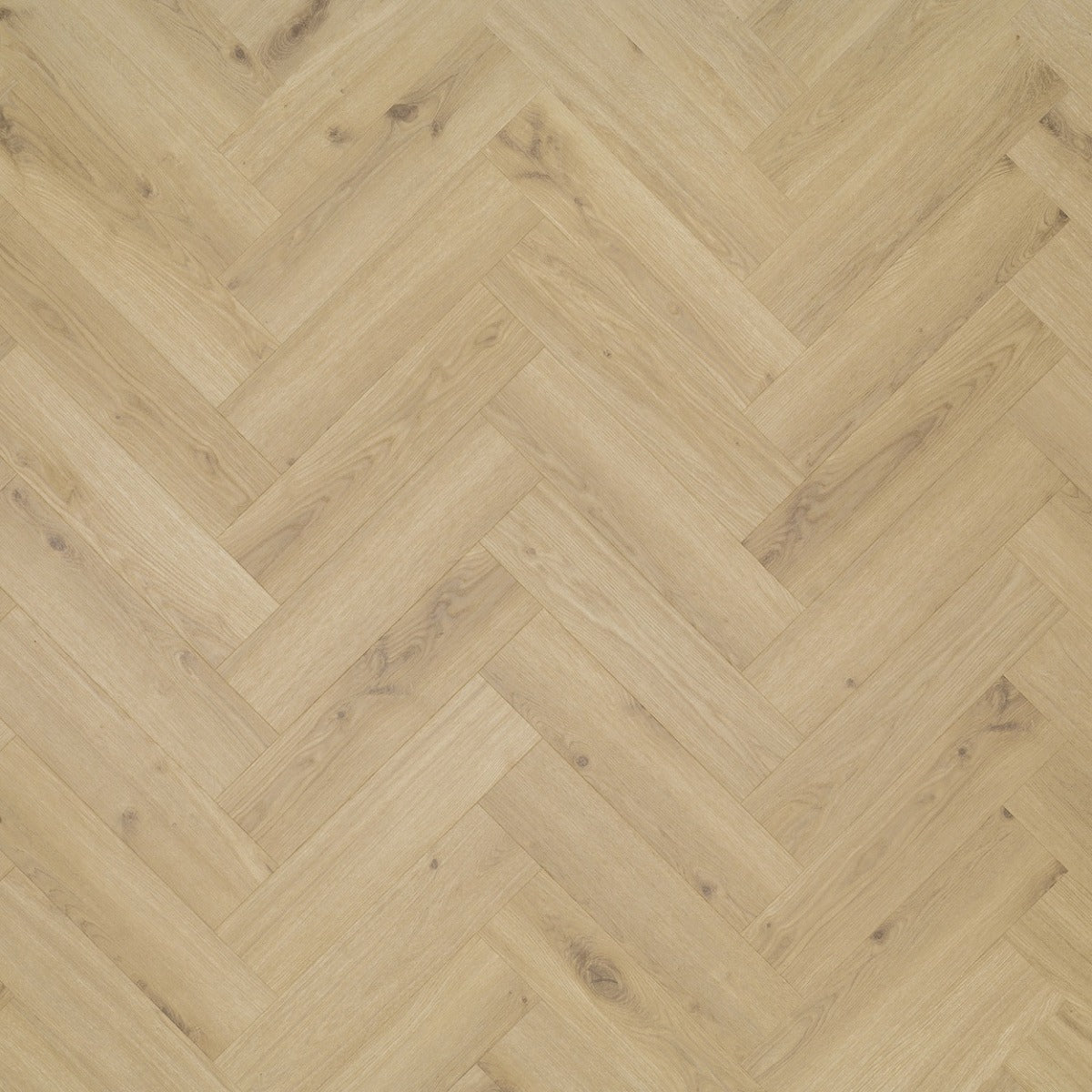 Tarkett iD Inspiration 55 Visgraat Delicate Oak Almond pvc vloer, zachte amandeltinten in visgraatpatroon voor een elegante uitstraling