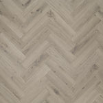 Tarkett iD Inspiration 55 Visgraat Delicate Oak Clay pvc vloer, zachte kleikleurige eikentinten in visgraatpatroon voor een warme uitstraling