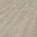 Vivafloors Eiken L8140 pvc vloer, voorzien van een stijlvolle eiken structuur, voegt een sfeervolle en verfijnde touch toe aan je interieur